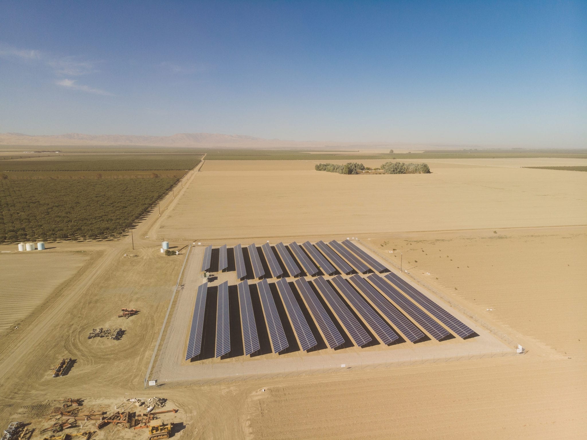 Aerial view of the small solar farm surrounded by plowed dirt fields at the Hammonds Ranch in Firebaugh, California.