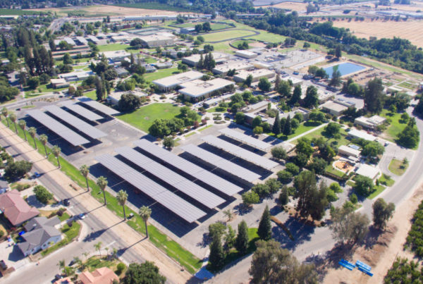 Aerial view of solar carport and commercial buildings in Fresno, California.