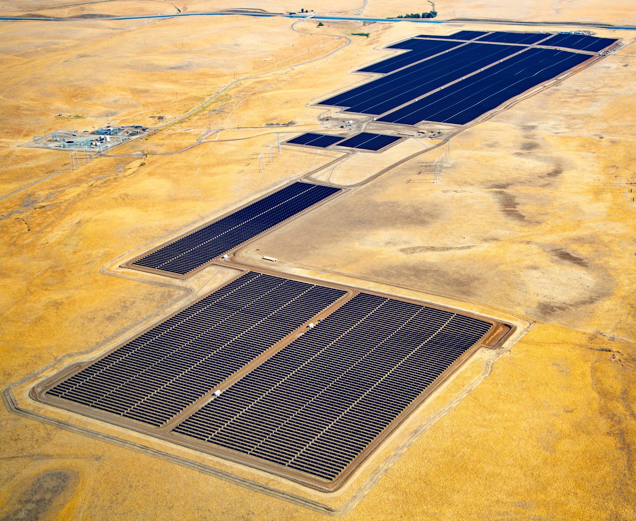 Aerial view of a utility-scale solar installation by Coldwell Solar in the California desert.