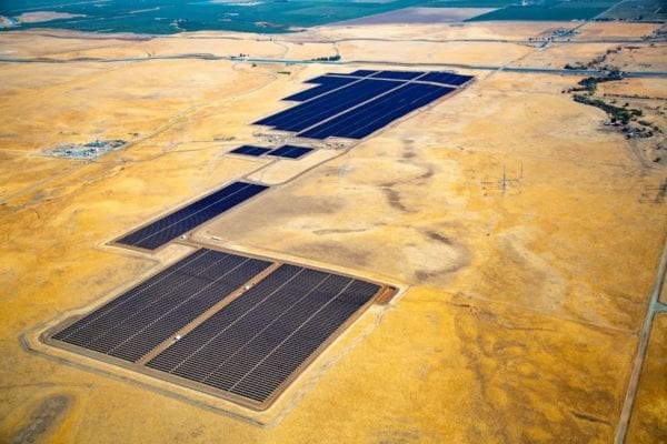 Aerial view of a utility-scale solar installation by Coldwell Solar in the California desert.